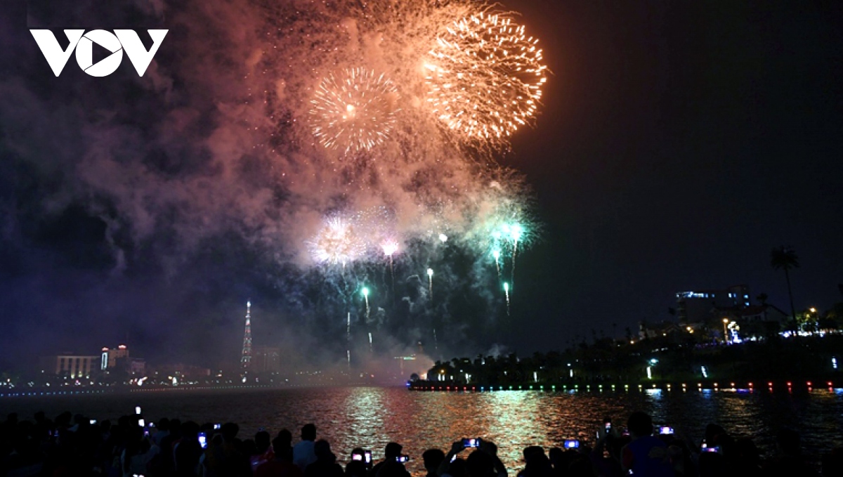 Fireworks light up night sky as people commemorate founders of nation
